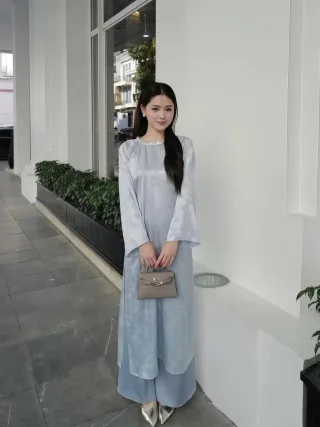 Photo 1 of Áo dài satin xanh nhạt nữ sang trọng