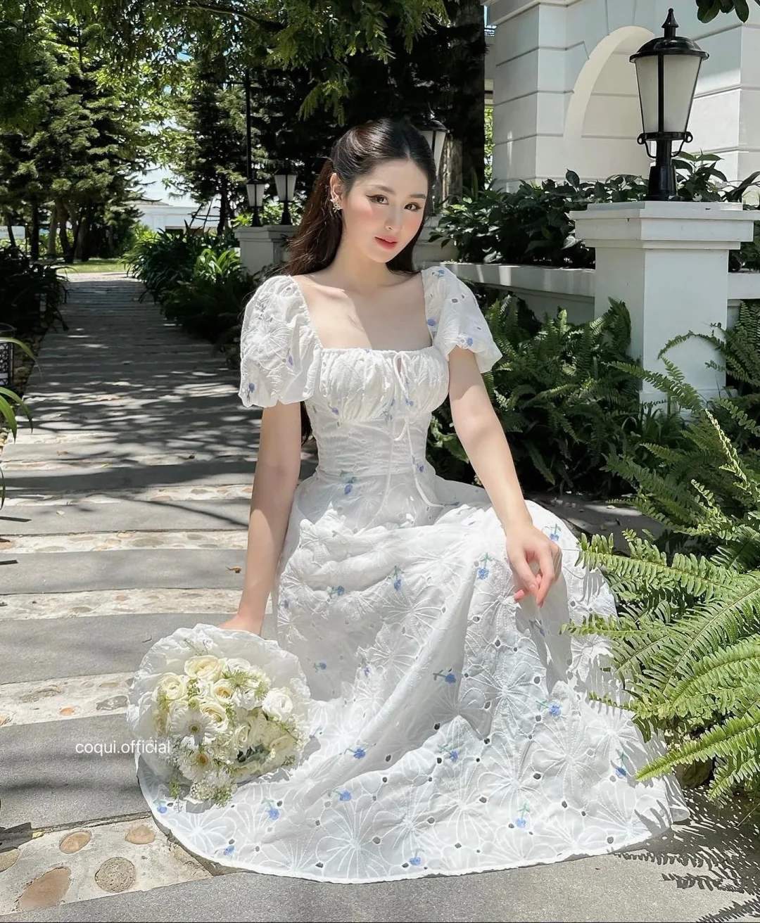 Photo 2 of Váy midi trắng hoa nhí Coqui size S