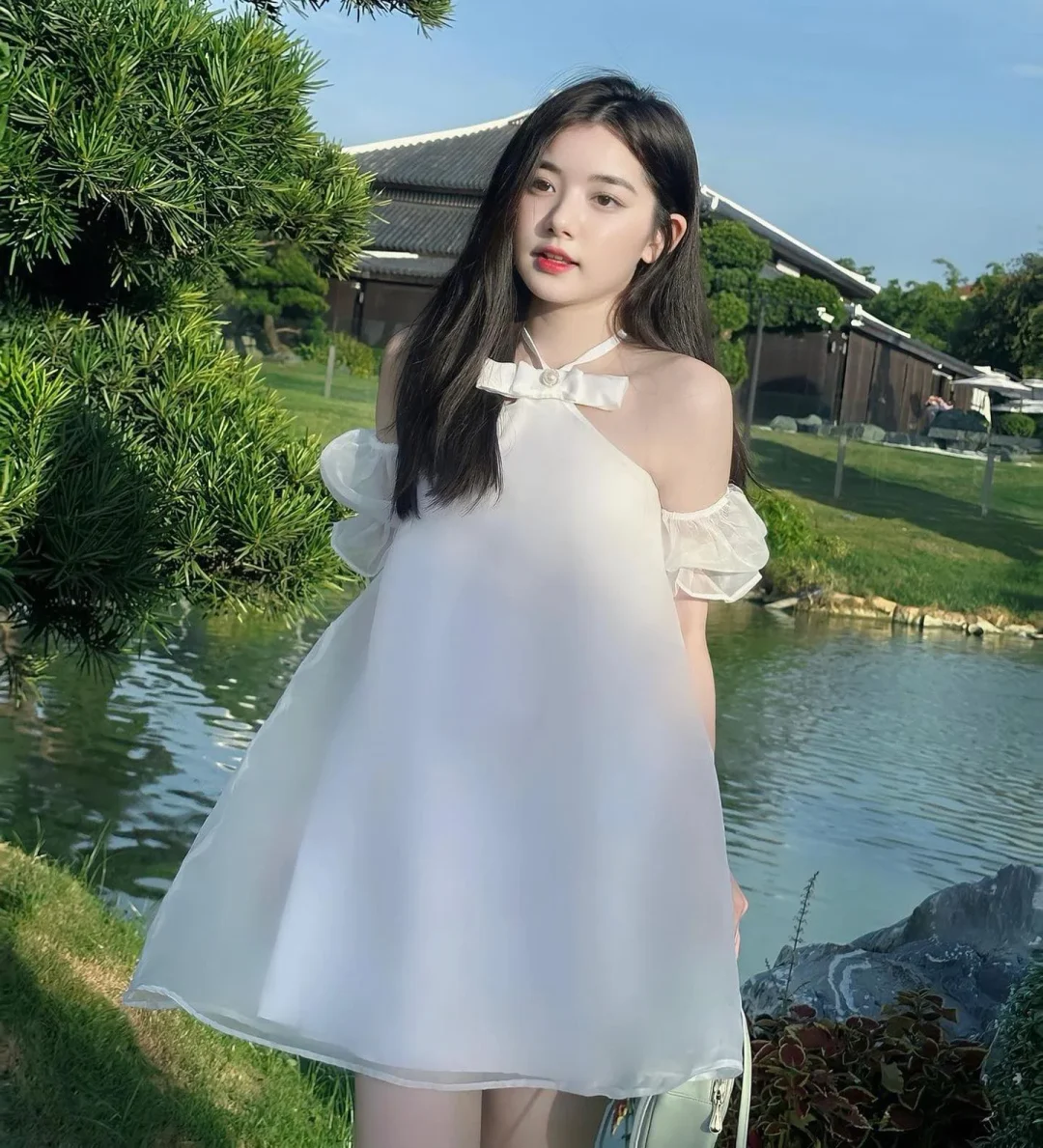 Photo 1 of Váy trắng hở vai nơ Juky dress size S