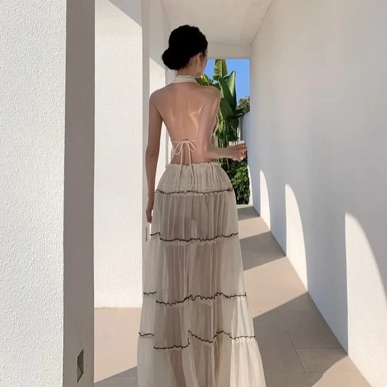 Photo 5 of Set Croptop Yếm Và Váy Maxi Voan Kem Nữ