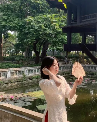 Photo 3 of Áo dài hồng thêu hoa cho thuê nữ