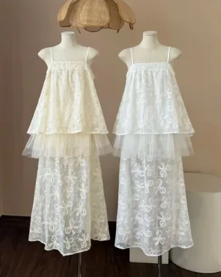 Photo 4 of Váy maxi ren trắng kem hai dây nữ