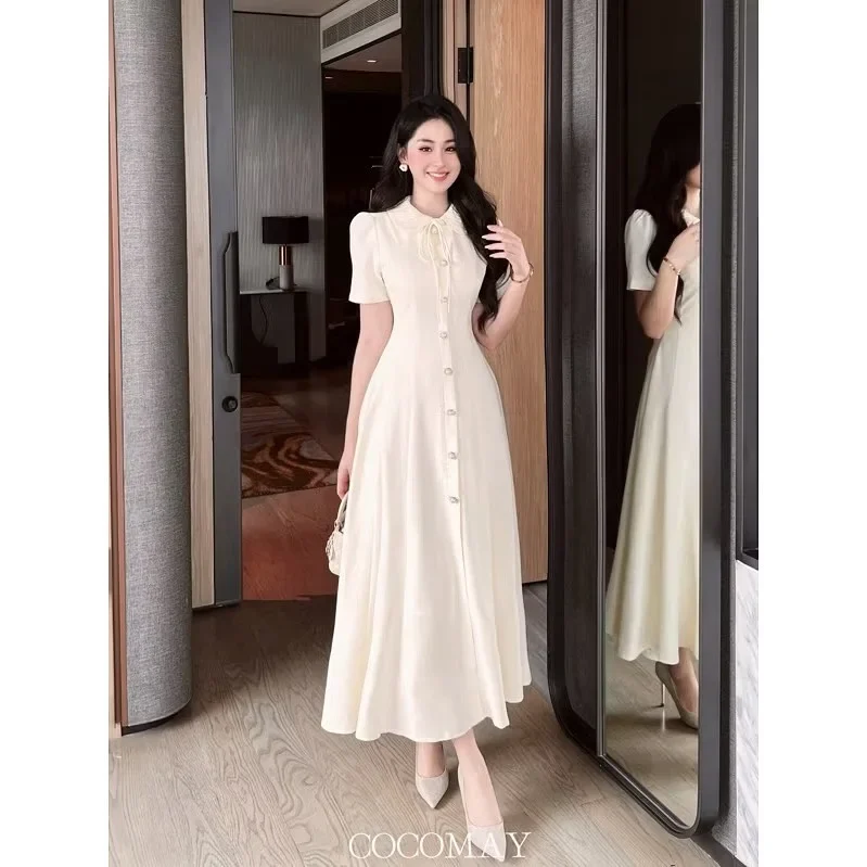 Photo 1 of Váy maxi kem cổ bẻ nữ tính