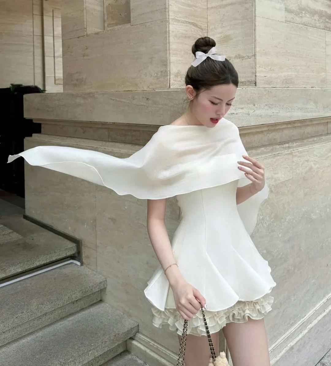 Ảnh 2 của Váy mini cape trắng lụa nữ