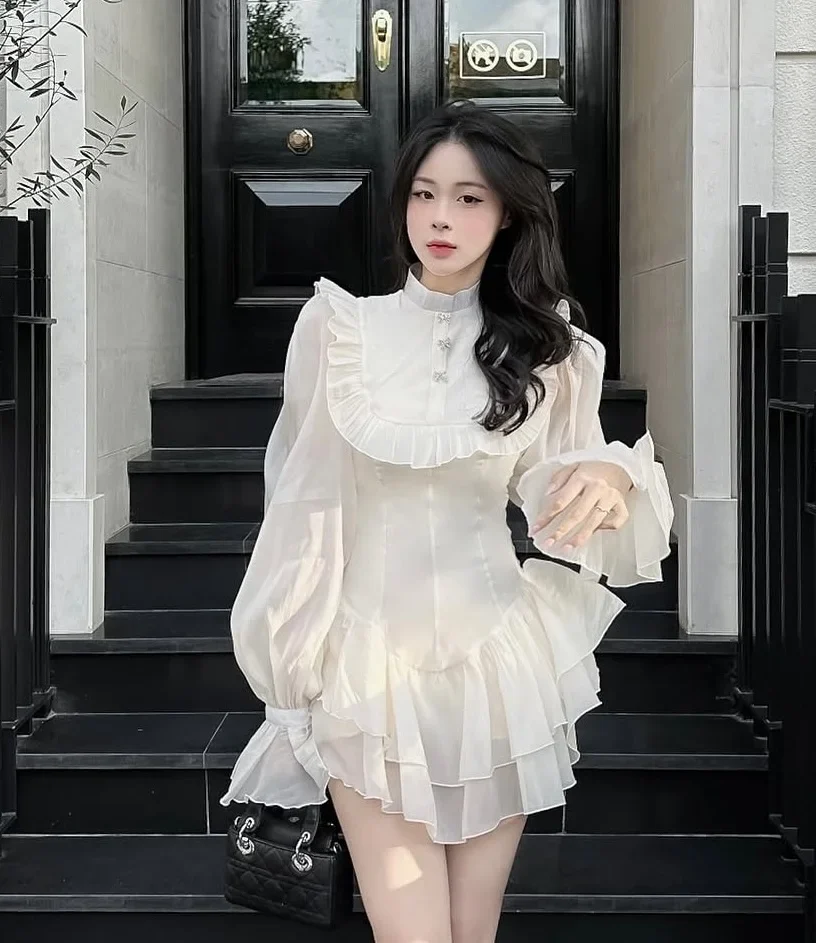 Photo 1 of Đầm voan kem bèo nhún tay phồng size M