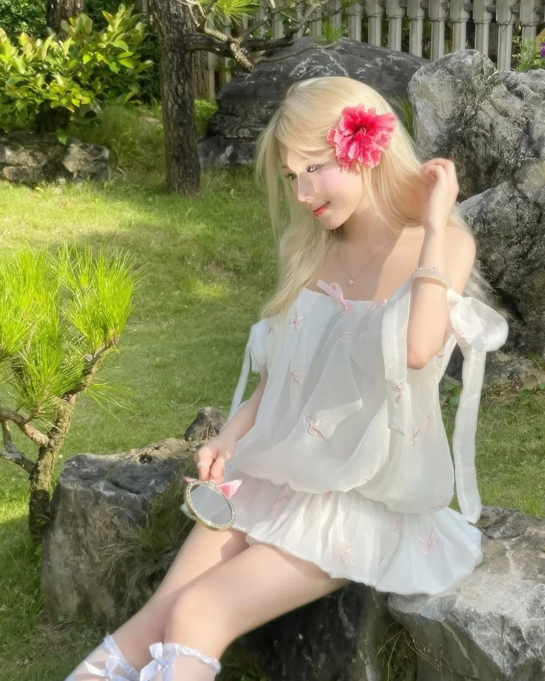 Photo 7 of Váy babydoll trắng nơ hồng nữ