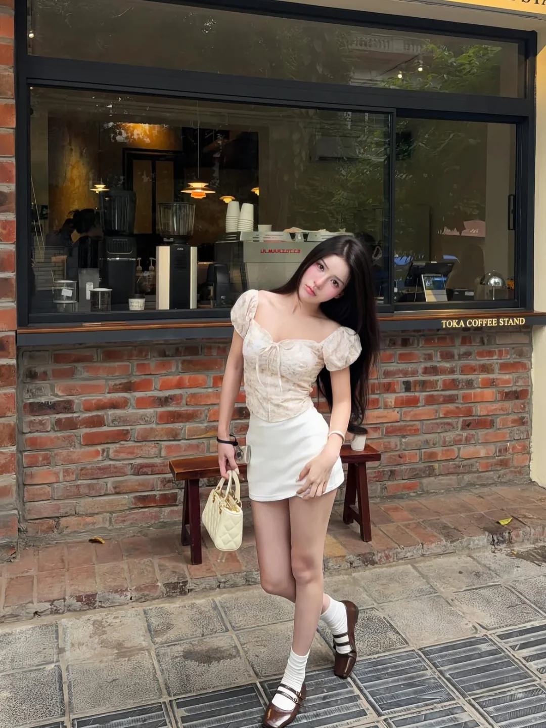 Photo 6 of Set áo corset hoa be phối váy trắng nữ