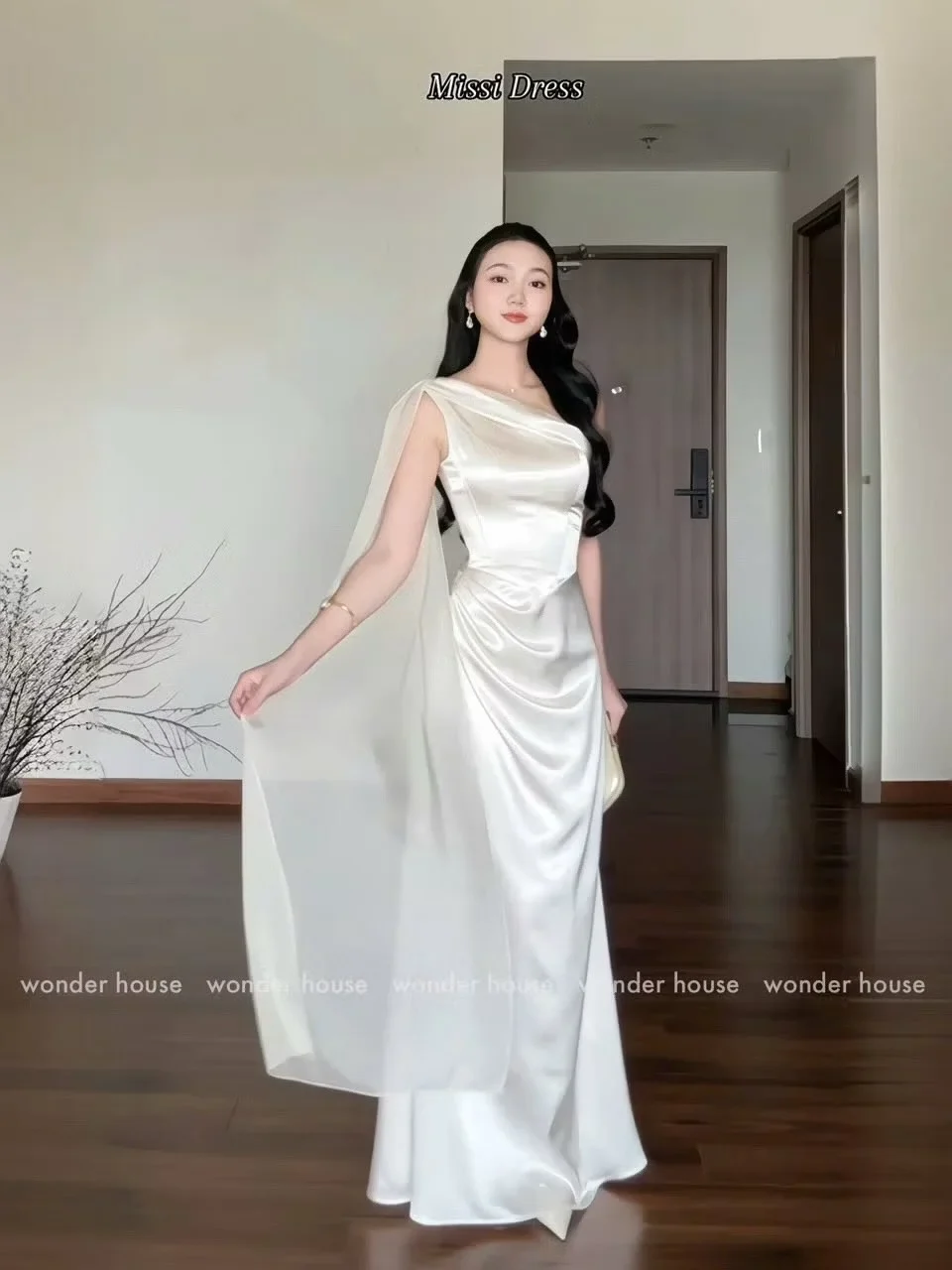 Ảnh 1 của Đầm satin lệch vai trắng sang trọng