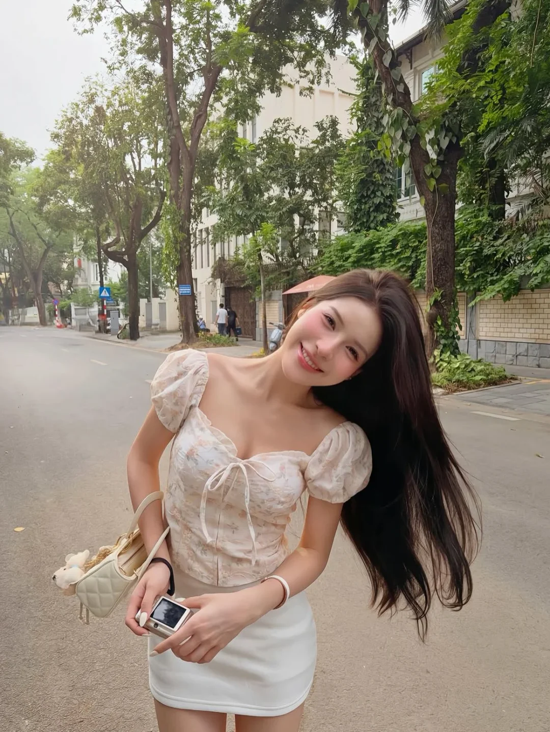 Photo 4 of Set áo corset hoa be phối váy trắng nữ