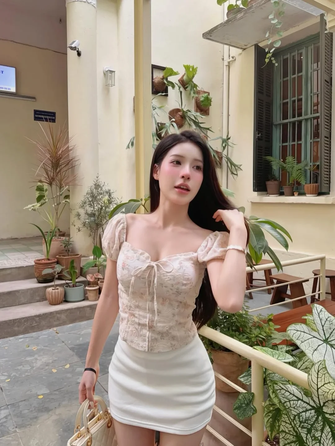 Photo 7 of Set áo corset hoa be phối váy trắng nữ