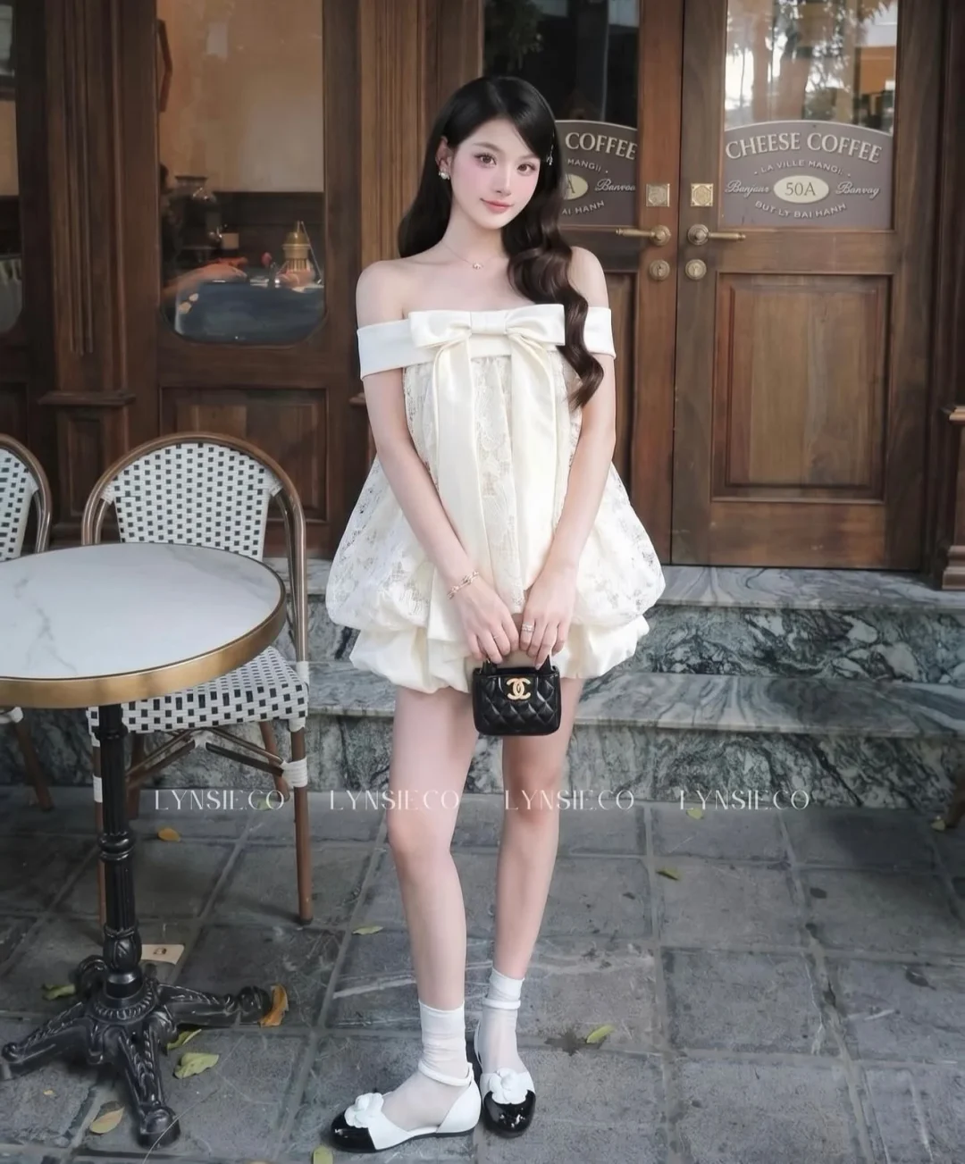 Ảnh 1 của Váy mini nơ vai búp bê màu kem