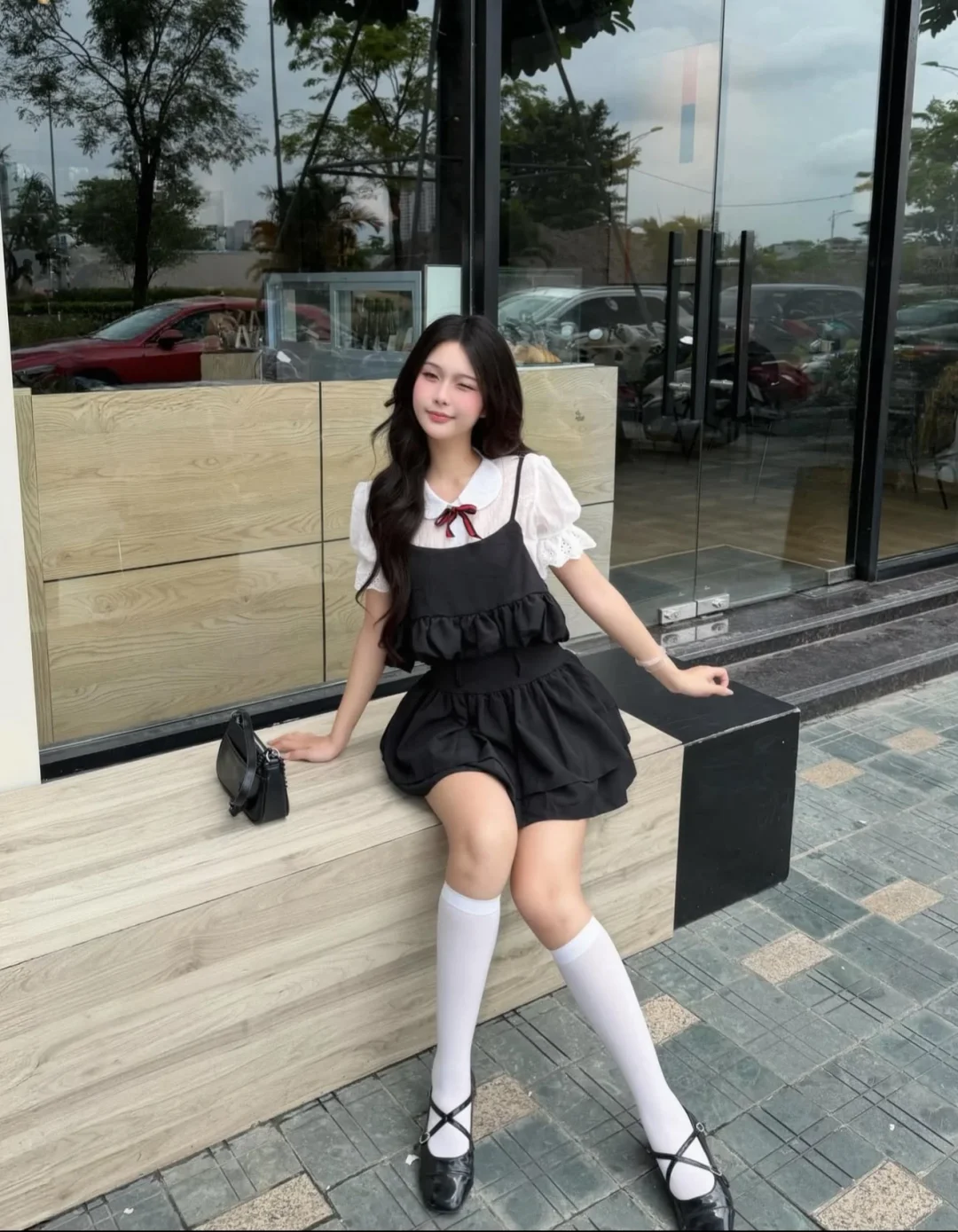 Ảnh 5 của Váy babydoll đen hai dây nơ đỏ size M