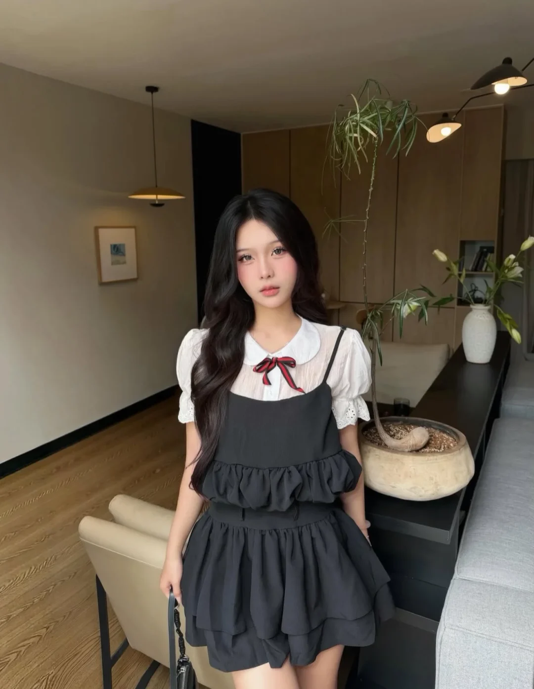 Ảnh 1 của Váy babydoll đen hai dây nơ đỏ size M