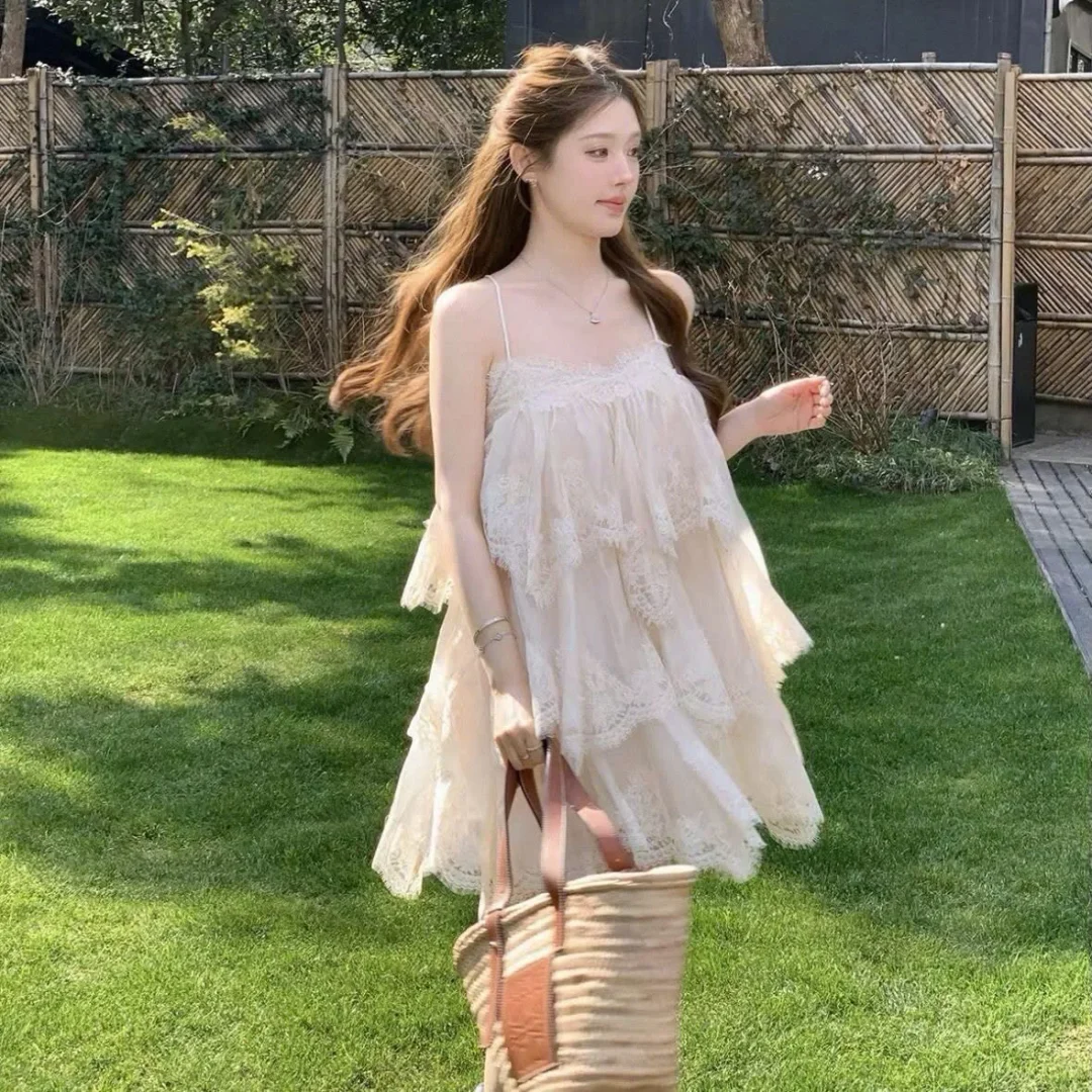 Photo 2 of Đầm babydoll ren kem size M