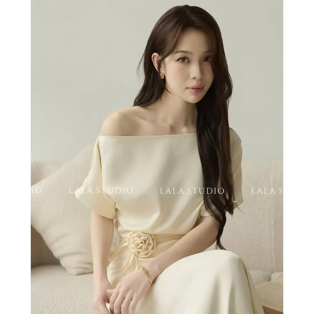 Photo 5 of Váy midi lụa kem trễ vai nữ