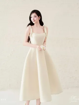 Ảnh 1 của Đầm hai dây nơ vai kem H.I.U fashion