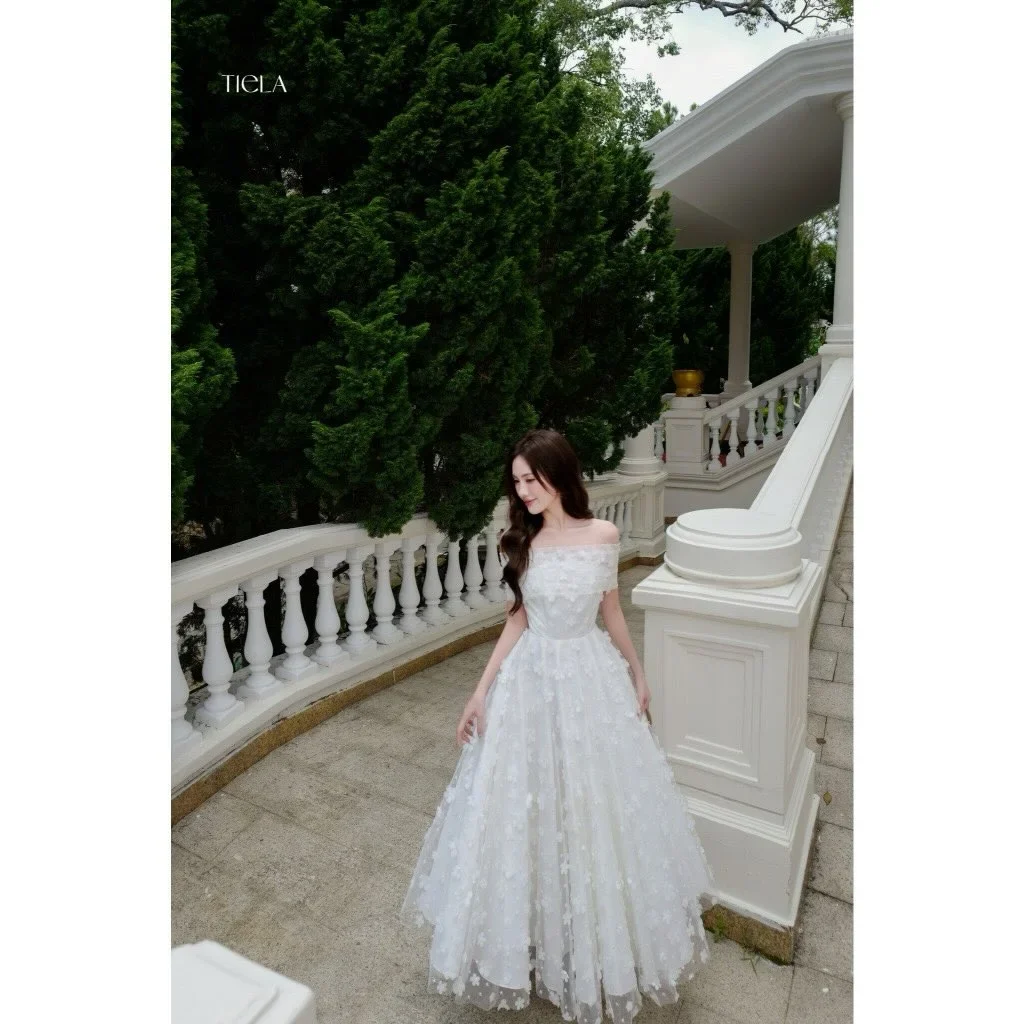 Ảnh 1 của Váy tiệc trắng hoa nổi Tiela