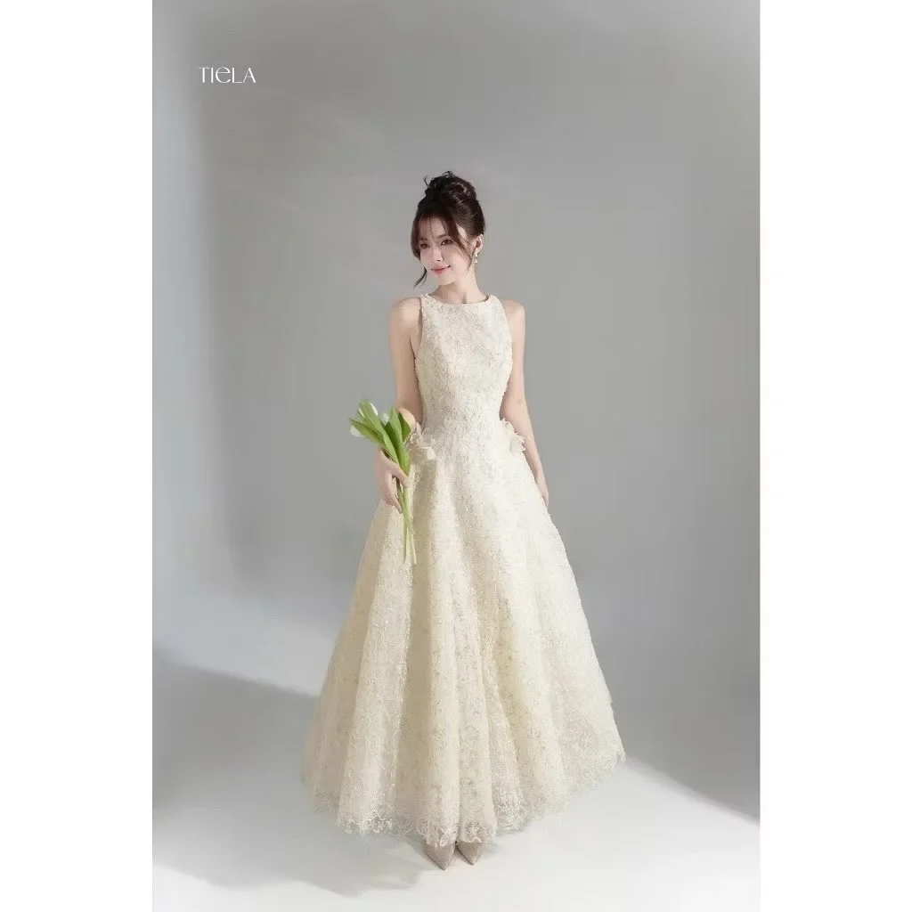 Photo 1 of Đầm Ren Trắng Kem Dạ Hội Tiela