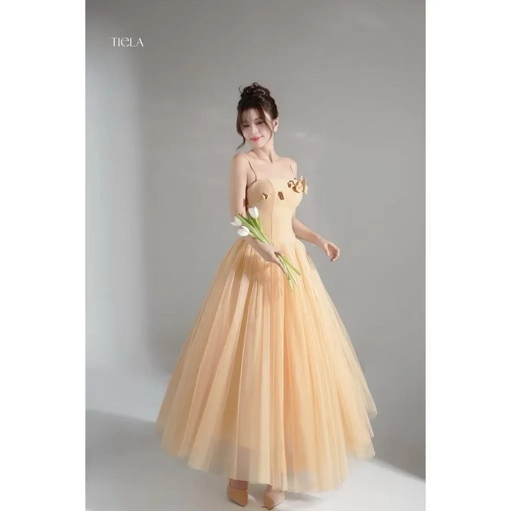 Ảnh 1 của Đầm dạ tiệc voan cam nhạt Tiela