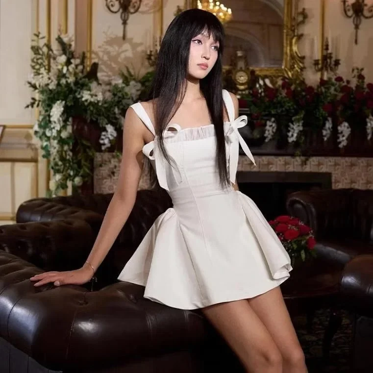 Ảnh 2 của Đầm mini trắng nơ vai Amelie size M