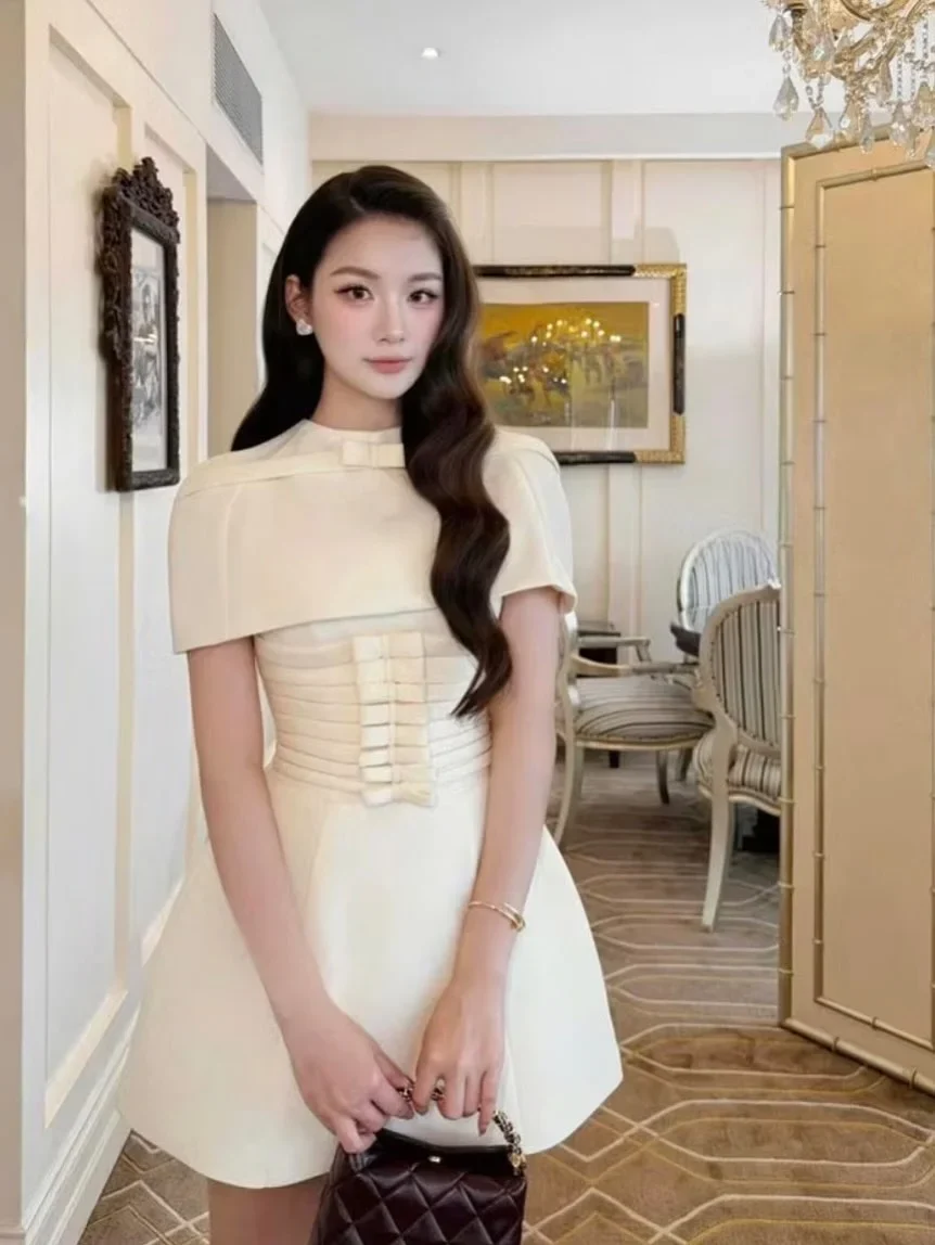 Ảnh 1 của Đầm mini kem nơ eo nữ size M