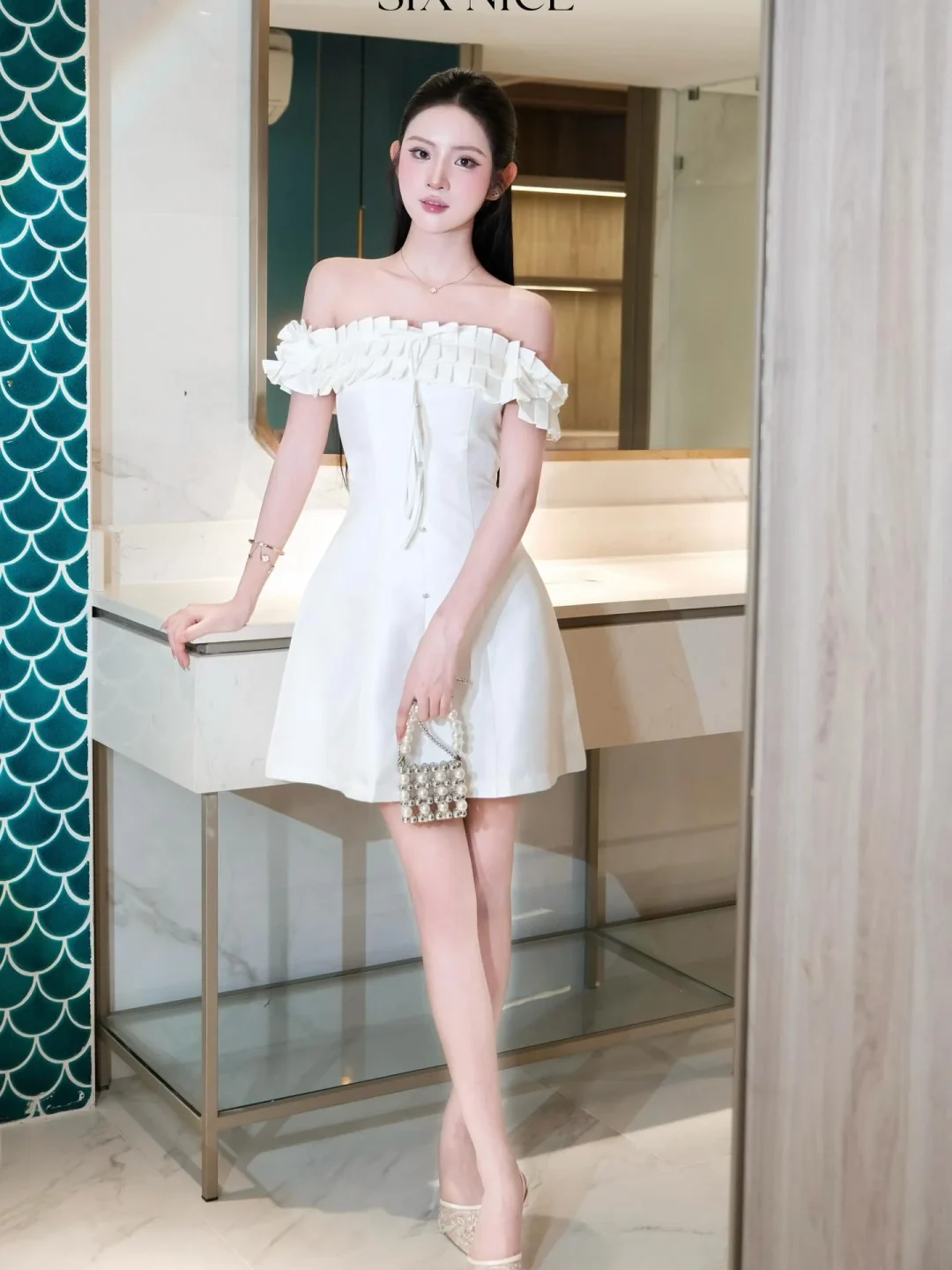 Photo 4 of Đầm trắng trễ vai bèo nhún nữ