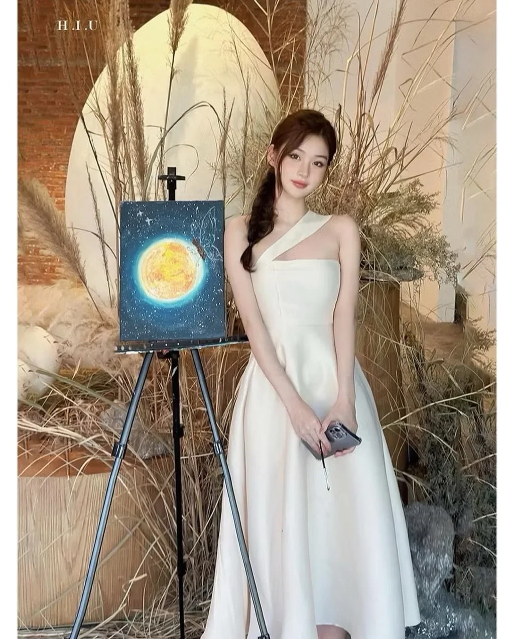 Photo 2 of Váy midi lệch vai kem H.I.U