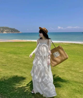 Photo 3 of Váy maxi trắng tầng ren nữ