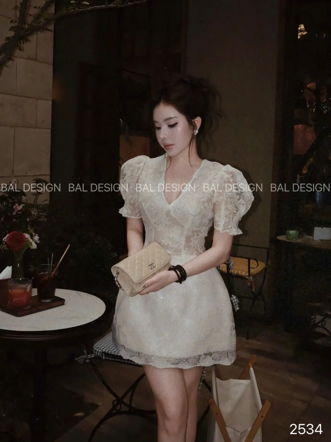 Ảnh 1 của Váy ren trắng tay phồng dự tiệc