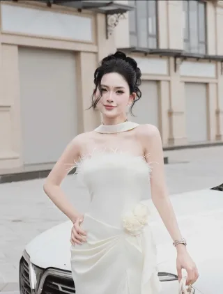 Photo 3 of Đầm trắng lông vũ dạ hội nữ