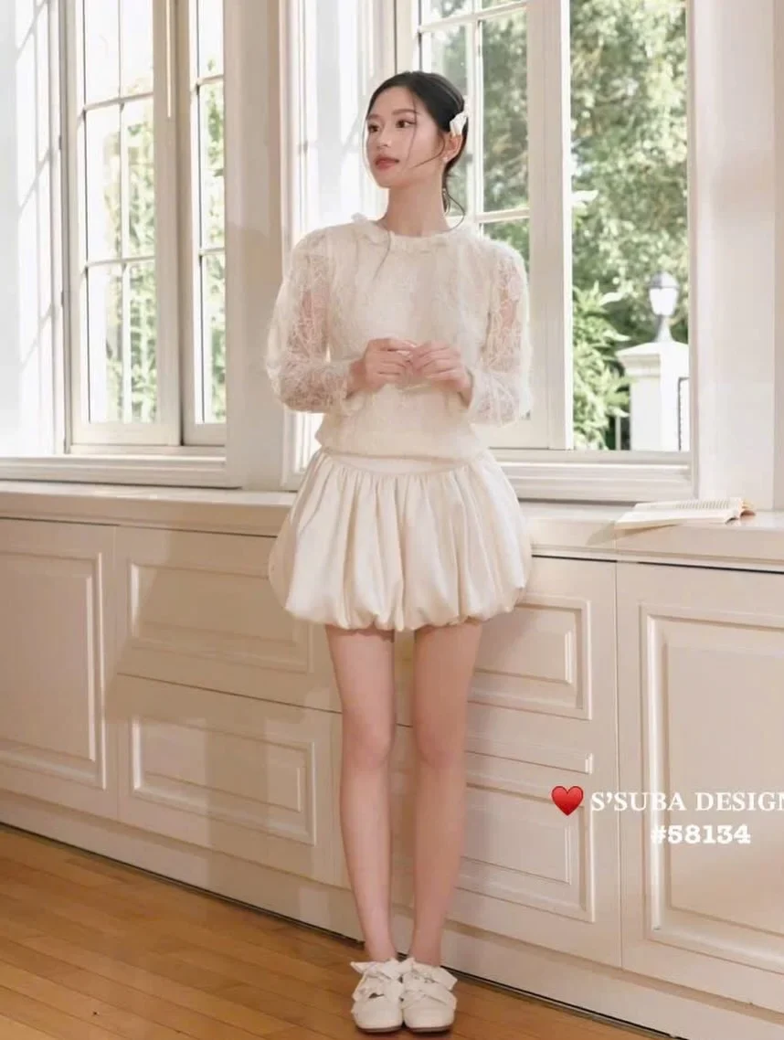 Photo 2 of Set áo ren tay phồng chân váy satin kem