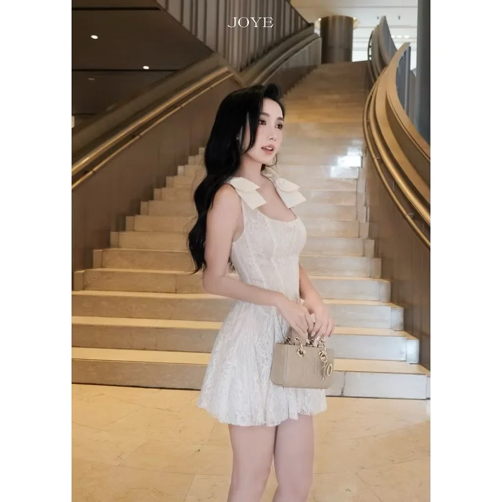 Ảnh 4 của Váy ren ngắn nơ vai màu kem nữ