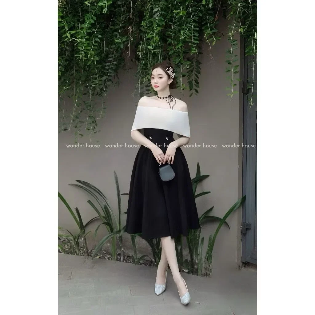 Ảnh 1 của Đầm trễ vai đen trắng Wonder House