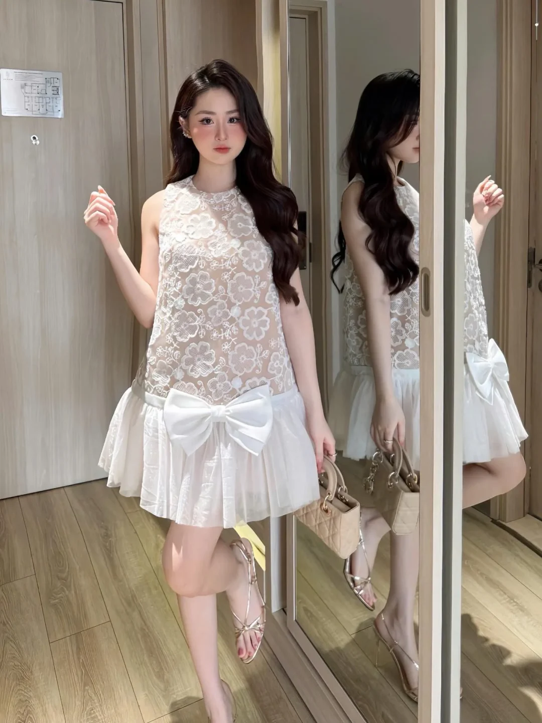 Photo 1 of Set váy ren trắng nơ lớn nữ