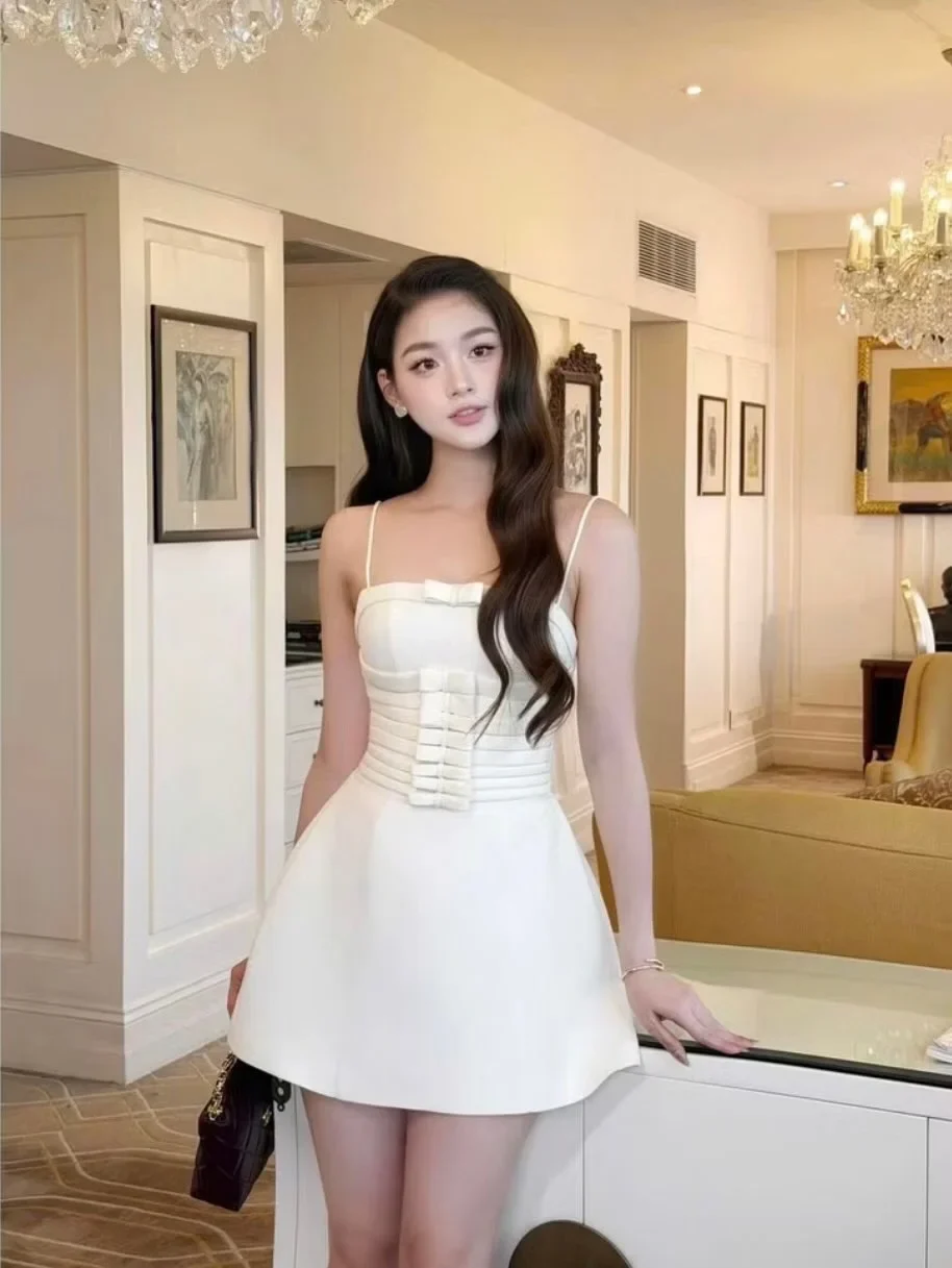 Ảnh 2 của Đầm mini kem nơ eo nữ size M