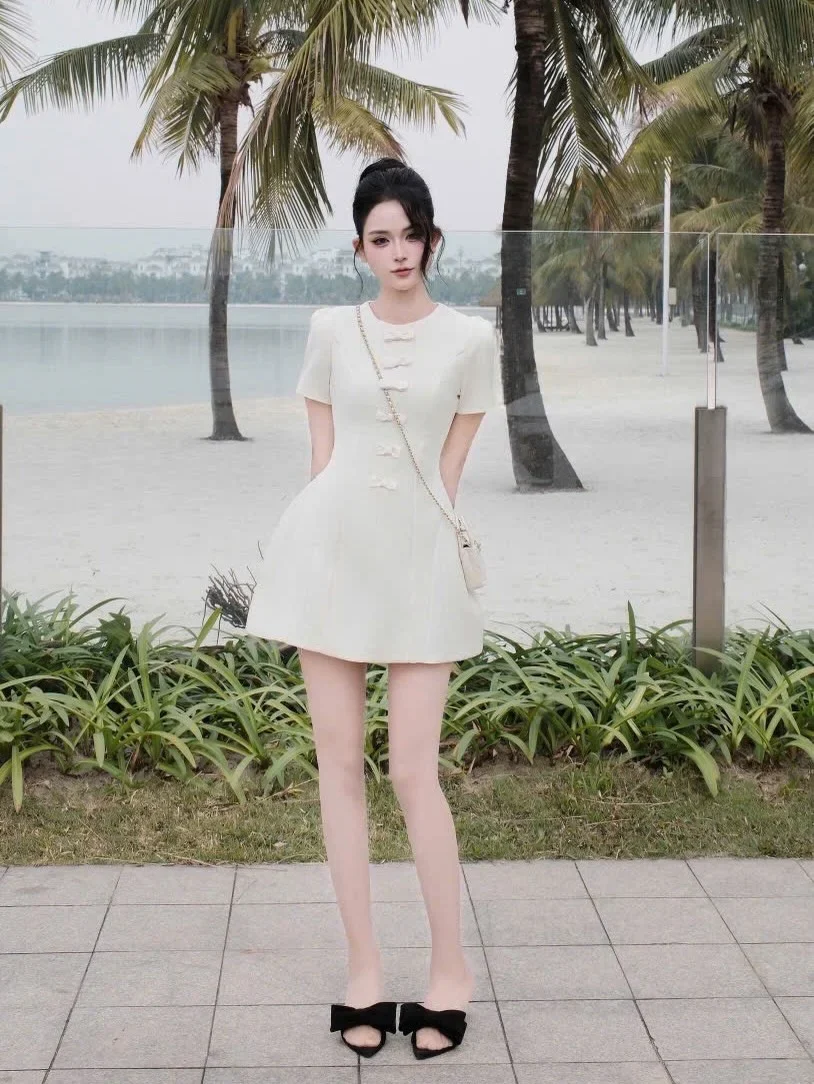 Ảnh 2 của Đầm ngắn trắng nơ nữ size M