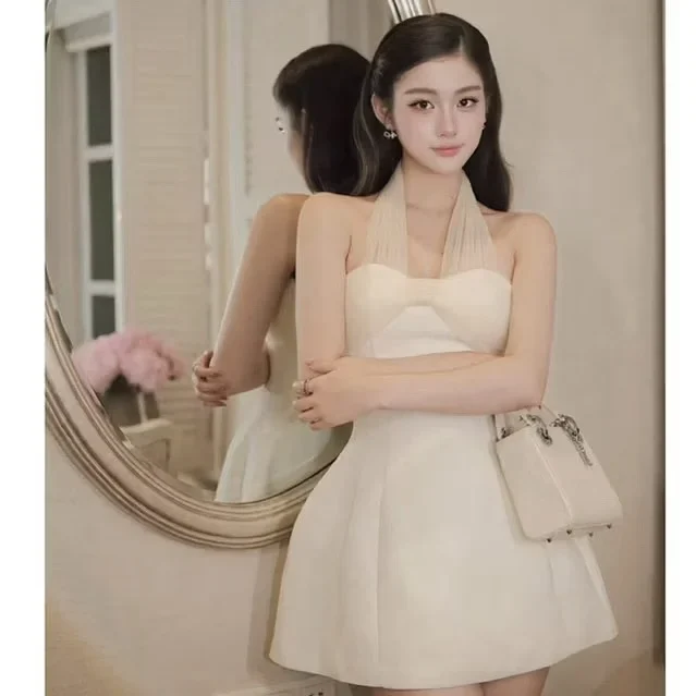 Photo 1 of Đầm trắng mini cúp ngực TC Dress