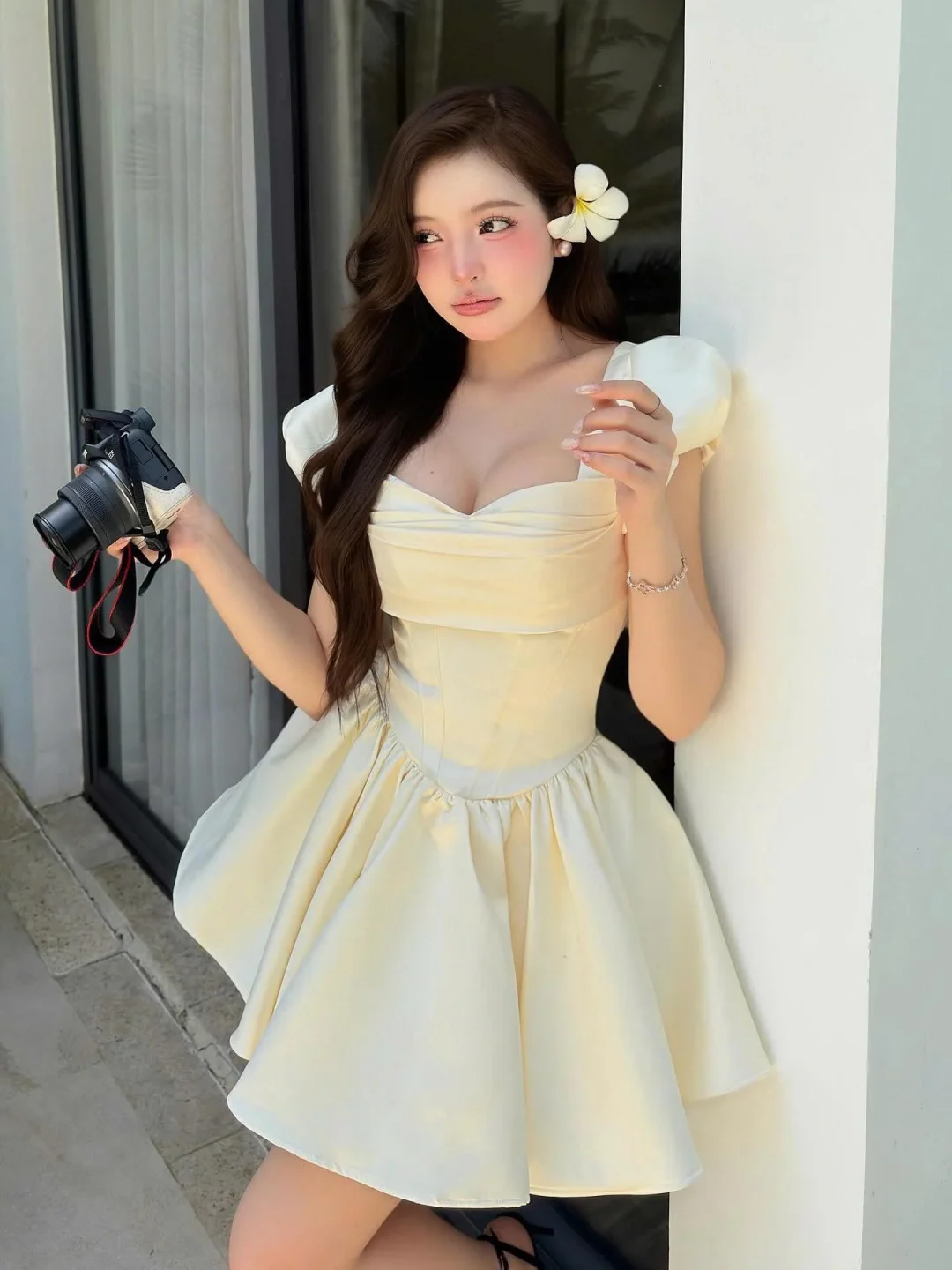 Photo 2 of Váy corset ngắn vàng nhạt size M
