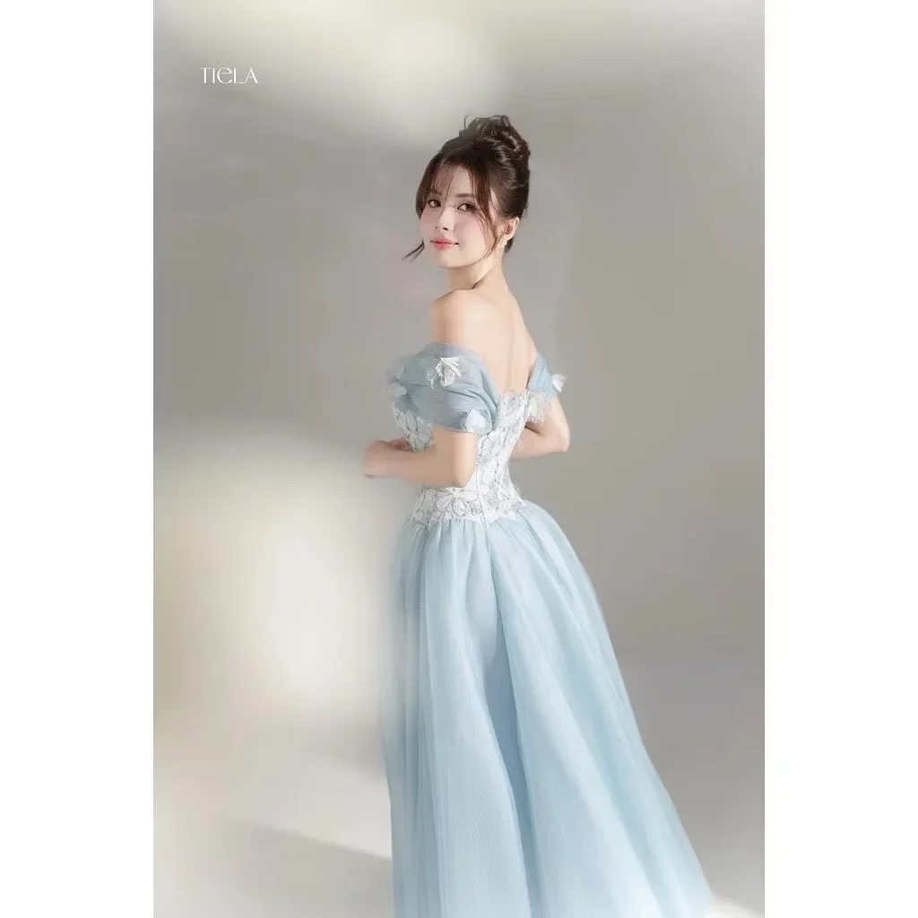 Photo 4 of Đầm dạ hội voan xanh pastel Tiela