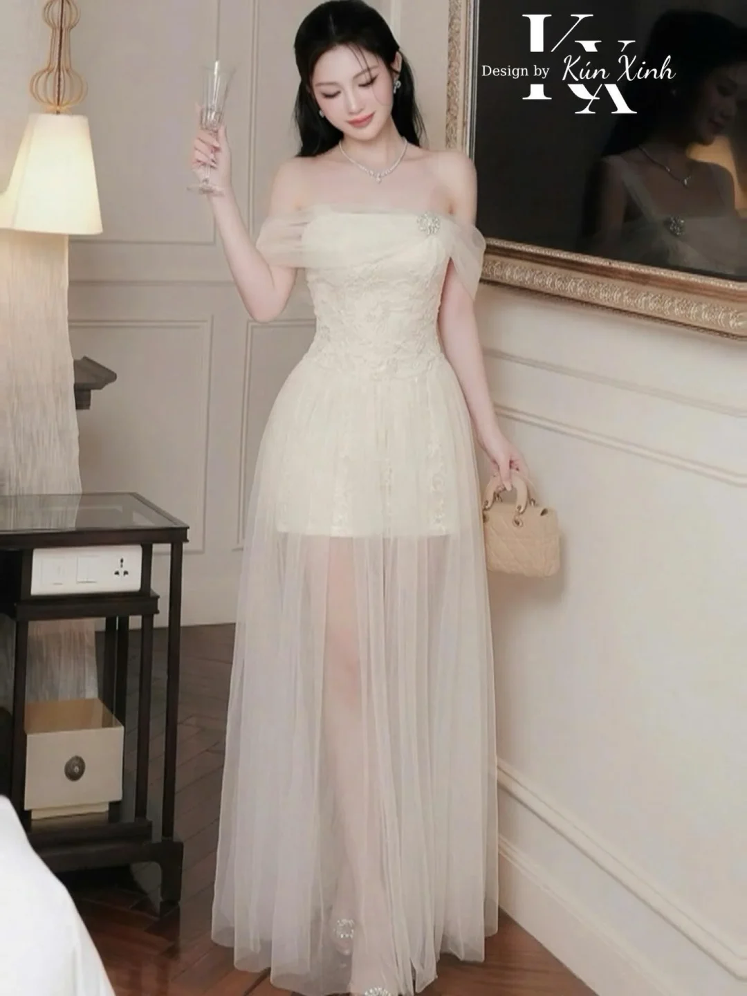 Photo 1 of Đầm dạ hội voan kem trễ vai nữ