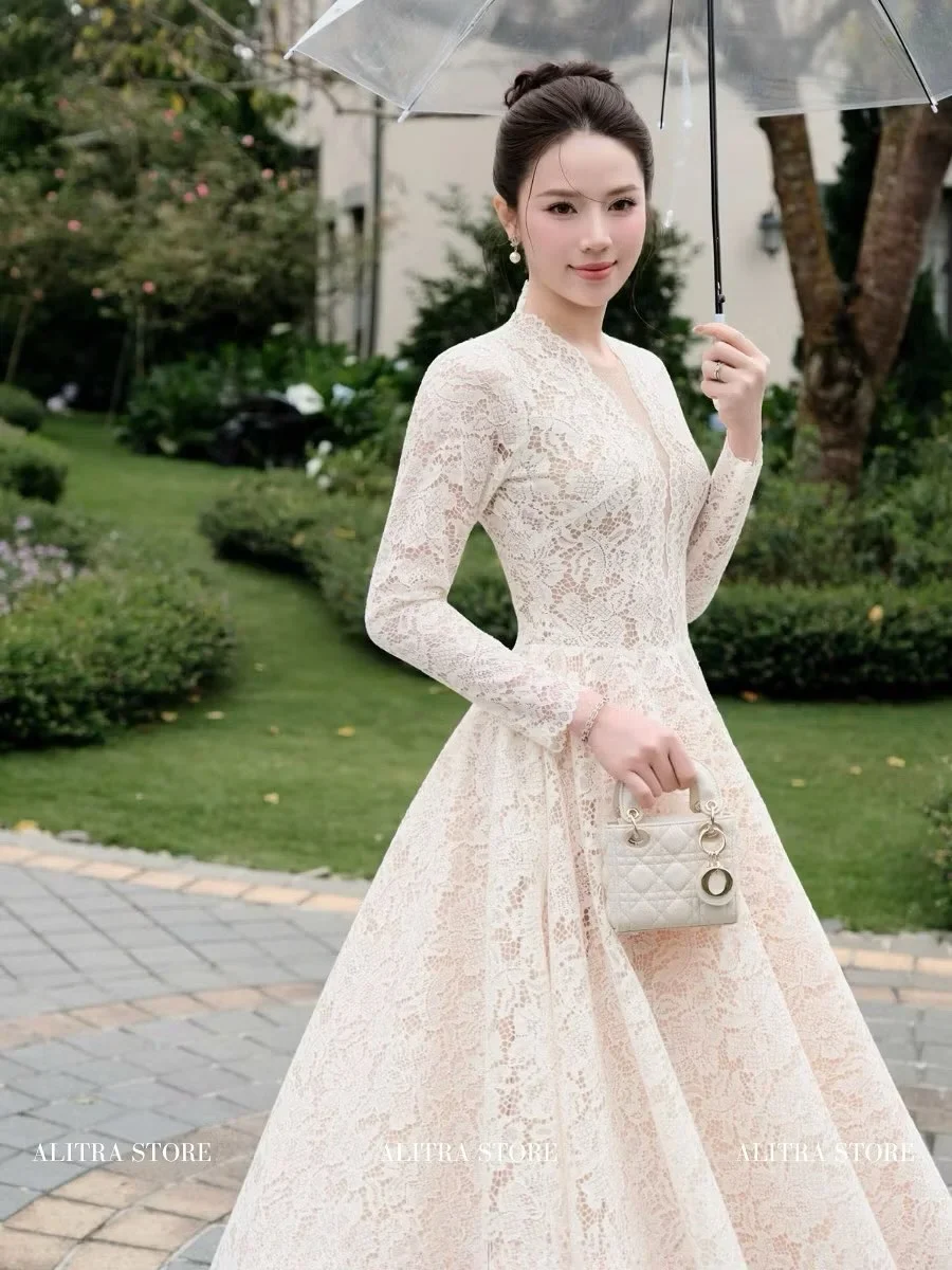 Photo 3 of Váy ren trắng kem dài tay nữ