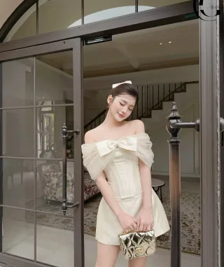 Ảnh 1 của Đầm ngắn trễ vai nơ lớn Chouchou