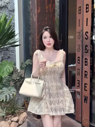 Photo 1 of Váy ren mini kem có nơ nữ