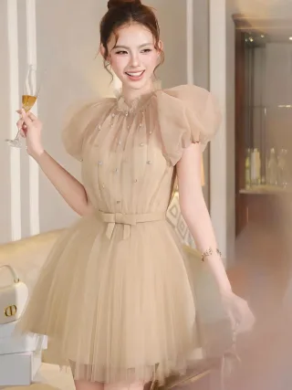 Photo 1 of Váy tiệc voan be tay phồng size M