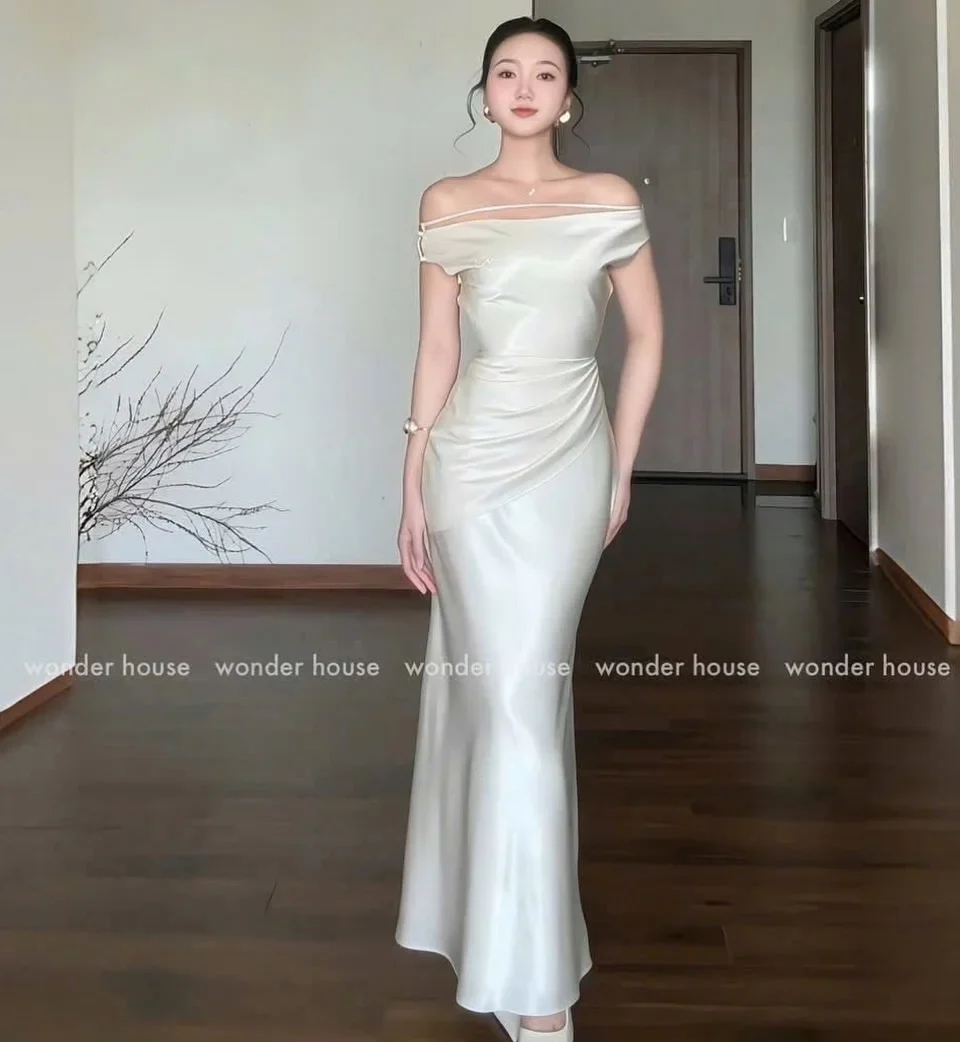 Ảnh 2 của Váy cưới trắng đính ngọc trai size S