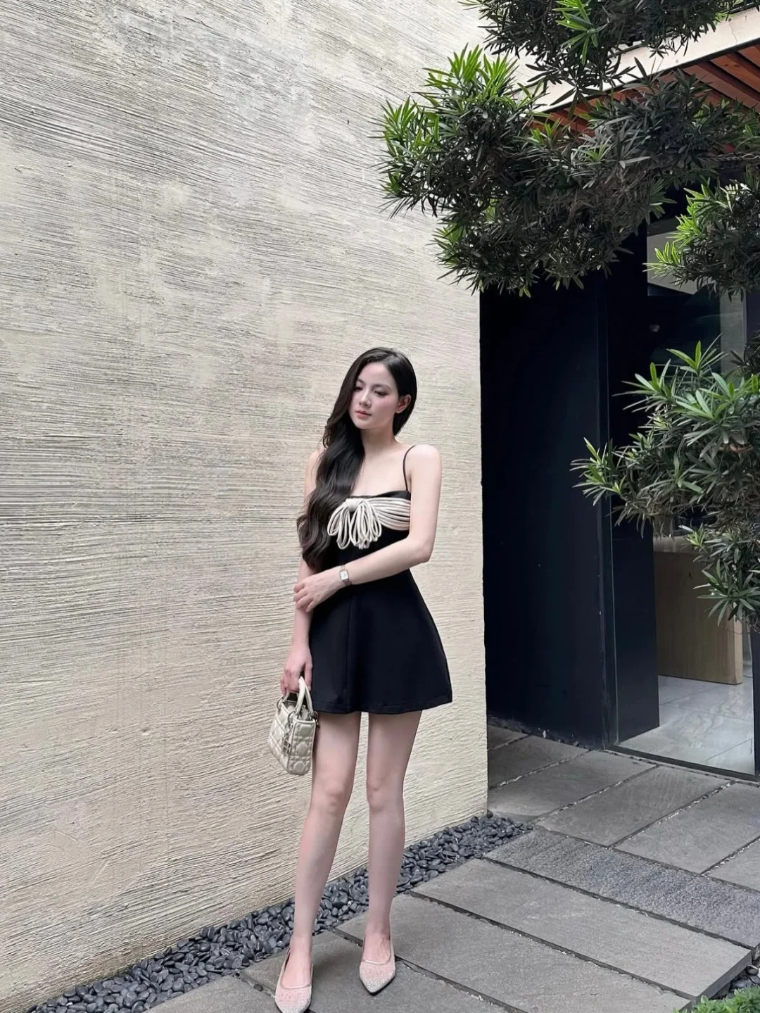 Photo 5 of Váy ngắn đen nơ trắng Aguja Studio