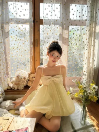 Photo 1 of Đầm babydoll vàng hai dây size S