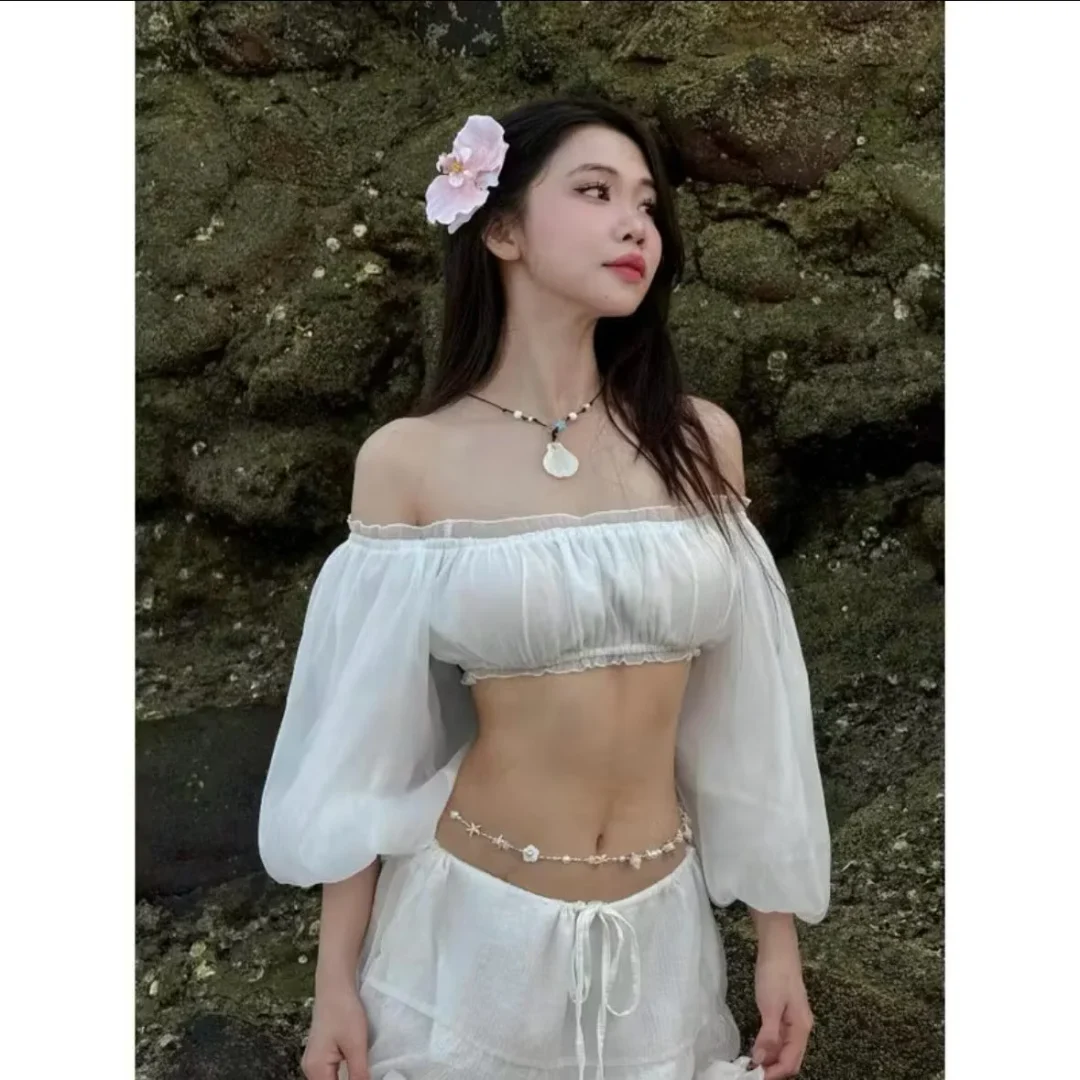 Photo 3 of Set croptop trễ vai chân váy voan trắng