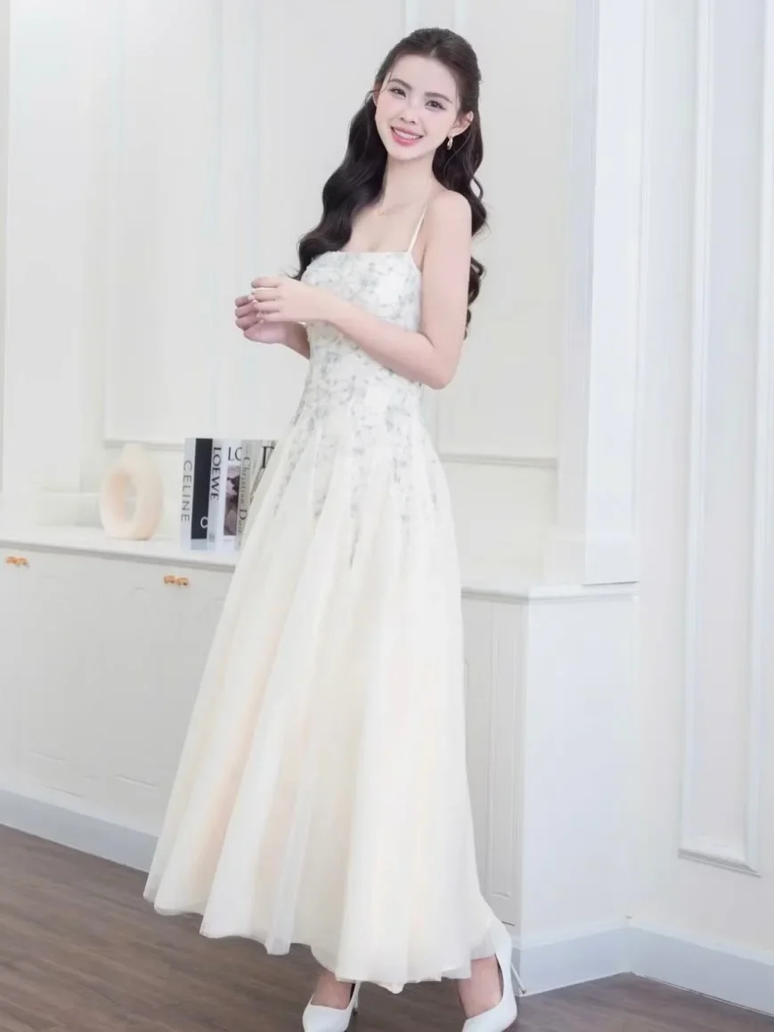 Photo 2 of Váy maxi hoa kem size S cho thuê