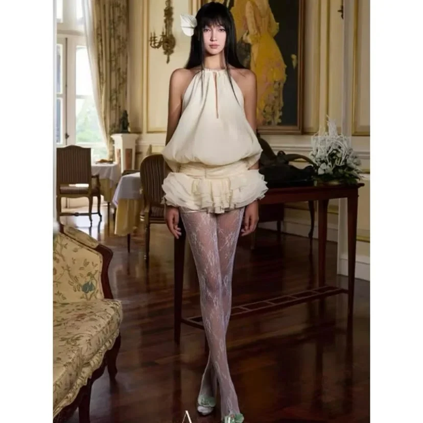 Photo 5 of Set áo yếm chân váy bèo trắng nữ